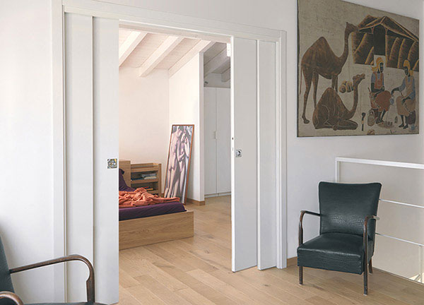 ECLISSE double telescopic sliding pocket door system