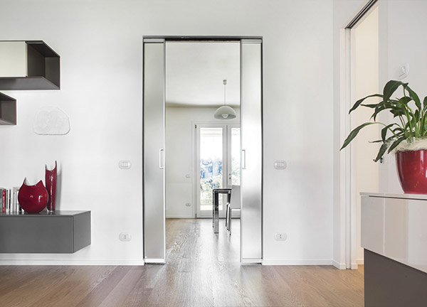 ECLISSE wiring-ready sliding pocket door system with no jambs nor architraves