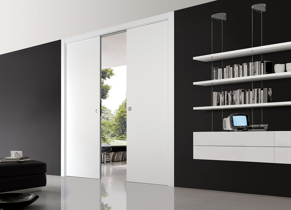 ECLISSE sliding pocket door system to hang loads